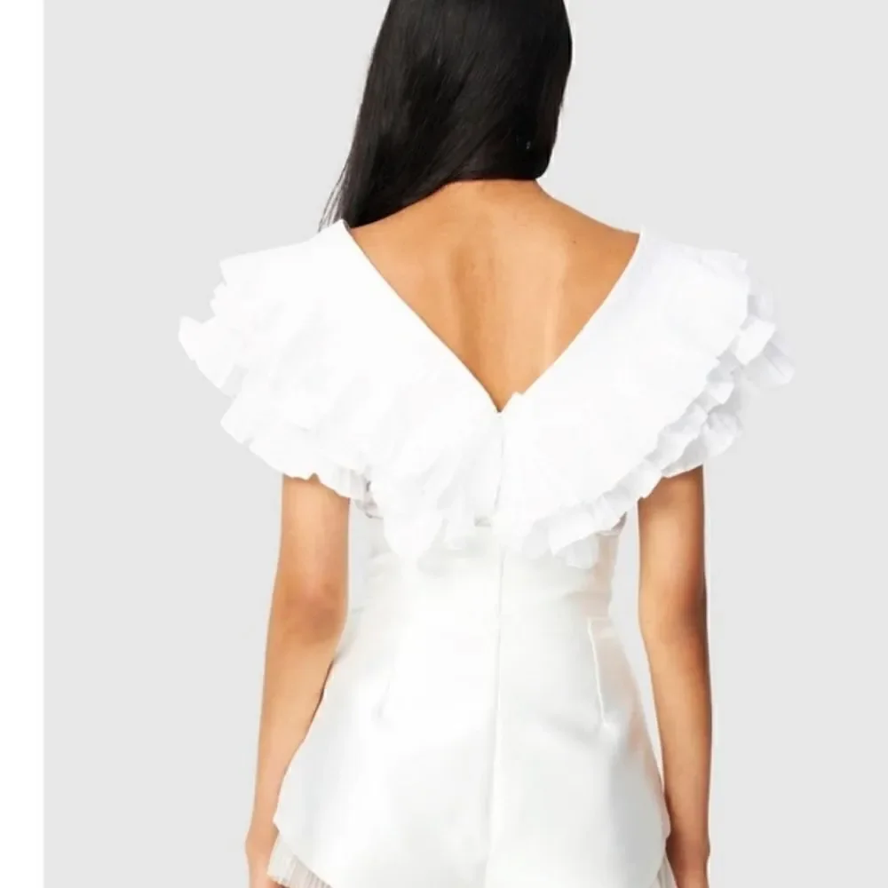 Par Violet V-neck Ruffle Peplum Top in White - Picture 12 of 13